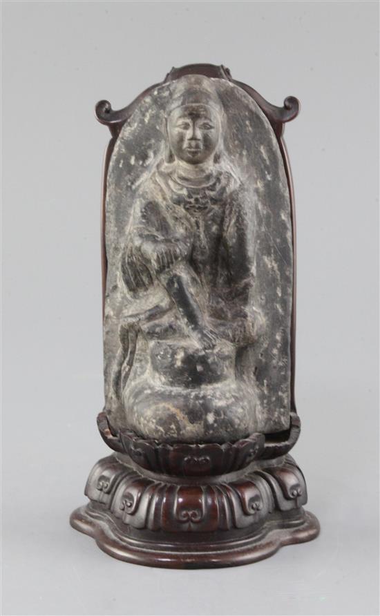 A Chinese limestone seated figure of Buddha, Northern Wei dynasty (386-535AD), total height 24cm